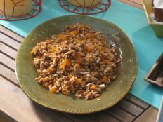Cooking Channel serves up this Homemade Mango-Agave Granola with Greek Yogurt recipe from Bobby Flay plus many other recipes at CookingChannelTV.com