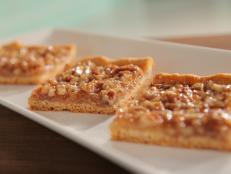 Cooking Channel serves up this Quick Crescent Pecan Pie Bars recipe  plus many other recipes at CookingChannelTV.com