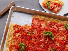 Cooking Channel serves up this Tomato Cheese Tart recipe from Chuck Hughes plus many other recipes at CookingChannelTV.com