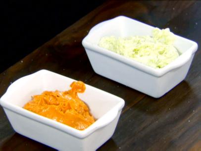 Creamy compound butters in small white dishes.