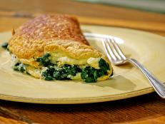 Cooking Channel serves up this Souffleed Spinach Omelette recipe from Laura Calder plus many other recipes at CookingChannelTV.com
