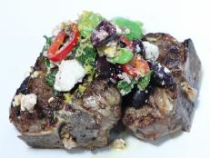 Cooking Channel serves up this Grilled T-bone Lamb Chops with Fava Bean and Feta Salad recipe from Michael Symon plus many other recipes at CookingChannelTV.com