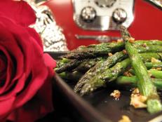 Cooking Channel serves up this Spicy Sauteed Asparagus with Tamari and Toasted Garlic recipe from Nadia G. plus many other recipes at CookingChannelTV.com