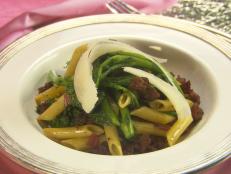 Cooking Channel serves up this Penne Rigate Sauteed with Rapini and Merguez Sausage recipe from Nadia G. plus many other recipes at CookingChannelTV.com