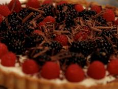 Cooking Channel serves up this Mascarpone and Wild Berry Tart recipe from Debi Mazar and Gabriele Corcos plus many other recipes at CookingChannelTV.com