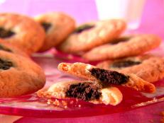 Cooking Channel serves up this Black and White Cookies recipe  plus many other recipes at CookingChannelTV.com