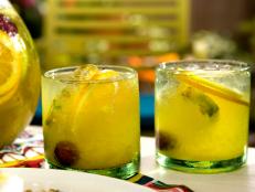 Cooking Channel serves up this Tropical Sangria recipe from Bobby Flay plus many other recipes at CookingChannelTV.com