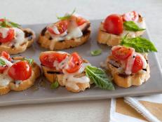 Cooking Channel serves up this Bruschetta Pizzaiola recipe from Debi Mazar and Gabriele Corcos plus many other recipes at CookingChannelTV.com
