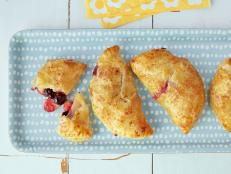 Cooking Channel serves up this Apple and Blueberry Hand Pies recipe from Michael Chiarello plus many other recipes at CookingChannelTV.com