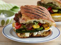 Cooking Channel serves up this Grilled Vegetable Panini with Herbed Feta Spread recipe from Kelsey Nixon plus many other recipes at CookingChannelTV.com