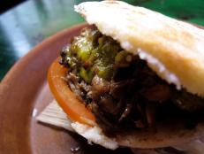 Cooking Channel serves up this Arepas de Pernil recipe  plus many other recipes at CookingChannelTV.com