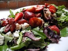 Cooking Channel serves up this Herb Marinated Pork Tenderloin Salad with Balsamic Strawberries and Goat Cheese recipe  plus many other recipes at CookingChannelTV.com
