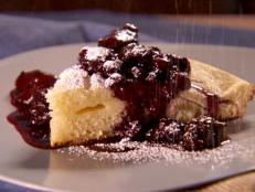 Cooking Channel serves up this German Fruit Pancake with Mixed Berry Syrup-St. Louis recipe from Dave Lieberman plus many other recipes at CookingChannelTV.com