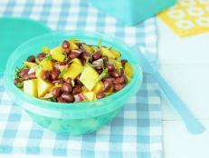Cooking Channel serves up this Black Bean Salad with Mango, Cilantro and Lime recipe from Kelsey Nixon plus many other recipes at CookingChannelTV.com