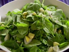 Cooking Channel serves up this Lightly Wilted Spinach Salad recipe from Alexandra Guarnaschelli plus many other recipes at CookingChannelTV.com
