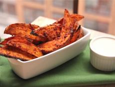 Cooking Channel serves up this Spicy Sweet Potato Wedges with Maple Dipping Sauce recipe from Kelsey Nixon plus many other recipes at CookingChannelTV.com