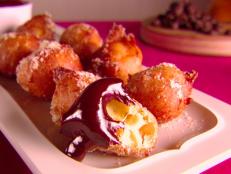 Cooking Channel serves up this Orange and Chocolate Zeppole recipe from Giada De Laurentiis plus many other recipes at CookingChannelTV.com