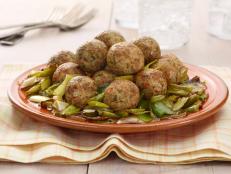 Cooking Channel serves up this Turkey Meatballs on a Bed of Leeks recipe from Debi Mazar and Gabriele Corcos plus many other recipes at CookingChannelTV.com