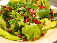 Cooking Channel serves up this Butter Lettuce, Mache and Pomegranate Seeds Dressed with Champagne Vinaigrette recipe from Debi Mazar and Gabriele Corcos plus many other recipes at CookingChannelTV.com