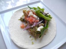 Cooking Channel serves up this Tomatillo Chicken Tacos recipe  plus many other recipes at CookingChannelTV.com