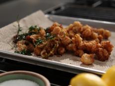 Cooking Channel serves up this Crispy Rock Shrimp with Lime and Coriander recipe from Michael Symon plus many other recipes at CookingChannelTV.com