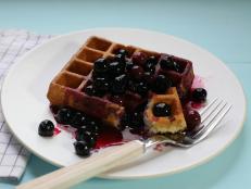 Cooking Channel serves up this Corn Waffles with Blueberry Syrup recipe  plus many other recipes at CookingChannelTV.com