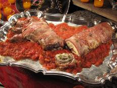 Cooking Channel serves up this Severed Braciole Arm recipe from Nadia G. plus many other recipes at CookingChannelTV.com