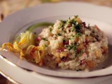 Cooking Channel serves up this Warm Risotto with Melon and Speck recipe from Debi Mazar and Gabriele Corcos plus many other recipes at CookingChannelTV.com