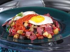 Cooking Channel serves up this Montreal Smoked Meat Hash with Chile Sauce recipe from Nadia G. plus many other recipes at CookingChannelTV.com