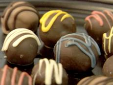 Cooking Channel serves up this Chocolate Truffles recipe from Bobby Flay plus many other recipes at CookingChannelTV.com