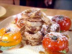 Cooking Channel serves up this Sliced Heirloom Tomato Stack with Blue Cheese recipe from Michael Chiarello plus many other recipes at CookingChannelTV.com