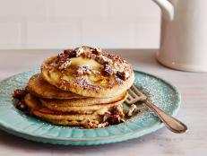 Cooking Channel serves up this Banana and Pecan Pancakes with Maple Butter recipe from Tyler Florence plus many other recipes at CookingChannelTV.com