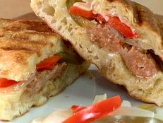 Cooking Channel serves up this Hot Italian Sausage Panini with Pickled Peppers recipe from Brian Boitano plus many other recipes at CookingChannelTV.com