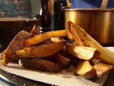 Cooking Channel serves up this Twice-Cooked Rustic Fries recipe from Tyler Florence plus many other recipes at CookingChannelTV.com