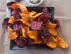 Cooking Channel serves up this Sweet Potato and Beet Chips with Garlic Rosemary Salt recipe from Giada De Laurentiis plus many other recipes at CookingChannelTV.com