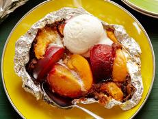 Cooking Channel serves up this Stone Fruit Pouches recipe from Alton Brown plus many other recipes at CookingChannelTV.com
