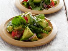 Cooking Channel serves up this Avocado Salad with Tomatoes, Lime, and Toasted Cumin Vinaigrette recipe from Bobby Flay plus many other recipes at CookingChannelTV.com