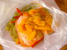 Cooking Channel serves up this Salmon Fillet en Papillote with Julienne Vegetable recipe from Alton Brown plus many other recipes at CookingChannelTV.com