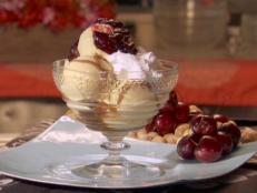 Cooking Channel serves up this Butterscotch, Marshmallow Fluff and Macadamia Nut or Spanish Peanut Sundae recipe from Bobby Flay plus many other recipes at CookingChannelTV.com