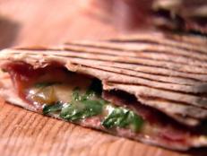 Cooking Channel serves up this Quesadillas recipe from Nigella Lawson plus many other recipes at CookingChannelTV.com