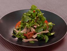 Cooking Channel serves up this Warm Beef and Watercress Salad: Bo Xao Sa Lat Song recipe from Luke Nguyen plus many other recipes at CookingChannelTV.com