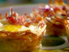 Cooking Channel serves up this Eggs in Baskets recipe from Sunny Anderson plus many other recipes at CookingChannelTV.com