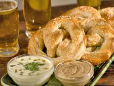 Cooking Channel serves up this Soft Pretzels with Queso Poblano Sauce and Mustard Sauce recipe from Bobby Flay plus many other recipes at CookingChannelTV.com