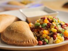 Cooking Channel serves up this Roasted Veggie Empanadas recipe  plus many other recipes at CookingChannelTV.com