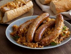 Cooking Channel serves up this Bratwurst Stewed with Sauerkraut recipe from Michael Symon plus many other recipes at CookingChannelTV.com
