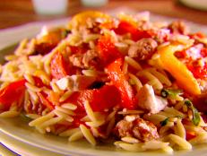 Cooking Channel serves up this Orzo with Sausage, Peppers and Tomatoes recipe from Giada De Laurentiis plus many other recipes at CookingChannelTV.com