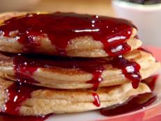Cooking Channel serves up this PB and J Pancakes recipe from Sunny Anderson plus many other recipes at CookingChannelTV.com