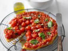 Cooking Channel serves up this Tomato and Basil Tarte Tatin recipe from Lorraine Pascale plus many other recipes at CookingChannelTV.com