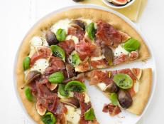 Cooking Channel serves up this Prosciutto, Mozzarella and Fig Pizza recipe from Lorraine Pascale plus many other recipes at CookingChannelTV.com
