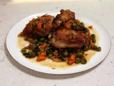Cooking Channel serves up this Spring Chicken with Carrots and Peas recipe from Rachael Ray plus many other recipes at CookingChannelTV.com